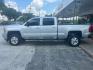 2017 Silver Ice Metallic Chevrolet Silverado 2500HD LT (1GC1KVEG8HF) with an Vortec 6L V-8 variable valve control engine, located at 12182 Garland Rd, Dallas, TX, 75218, (214) 521-2040, 0.000000, 0.000000 - Photo#3