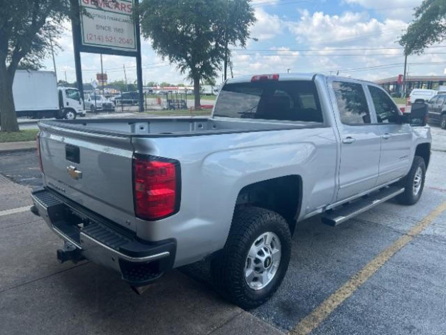 2017 Silver Ice Metallic Chevrolet Silverado 2500HD LT (1GC1KVEG8HF) with an Vortec 6L V-8 variable valve control engine, located at 12182 Garland Rd, Dallas, TX, 75218, (214) 521-2040, 0.000000, 0.000000 - Photo#6