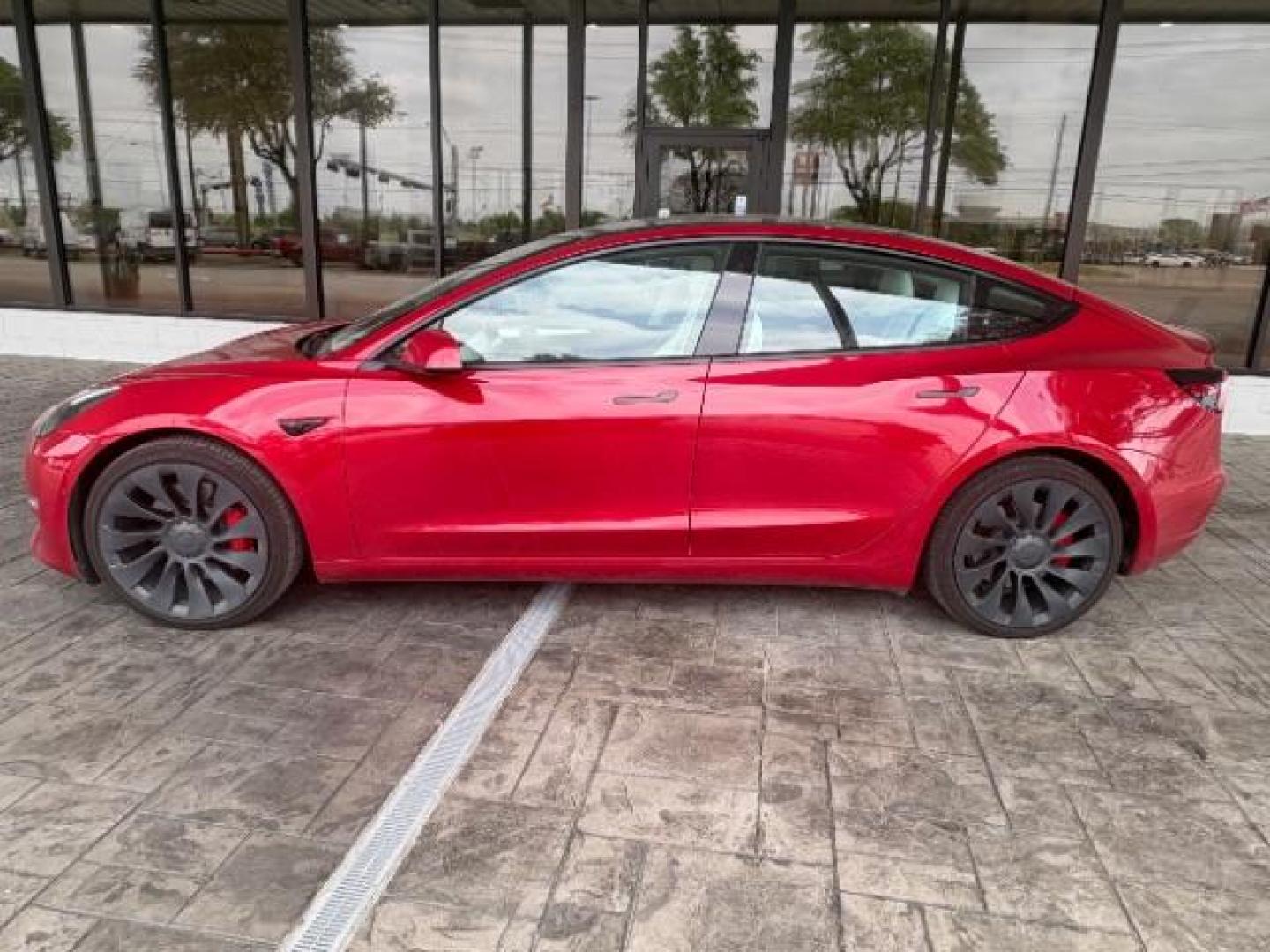 2022 Red Multi-Coat Tesla Model 3 Performance Dual Motor All-Wheel Drive (5YJ3E1EC1NF) , located at 12182 Garland Rd, Dallas, TX, 75218, (214) 521-2040, 0.000000, 0.000000 - Photo#3