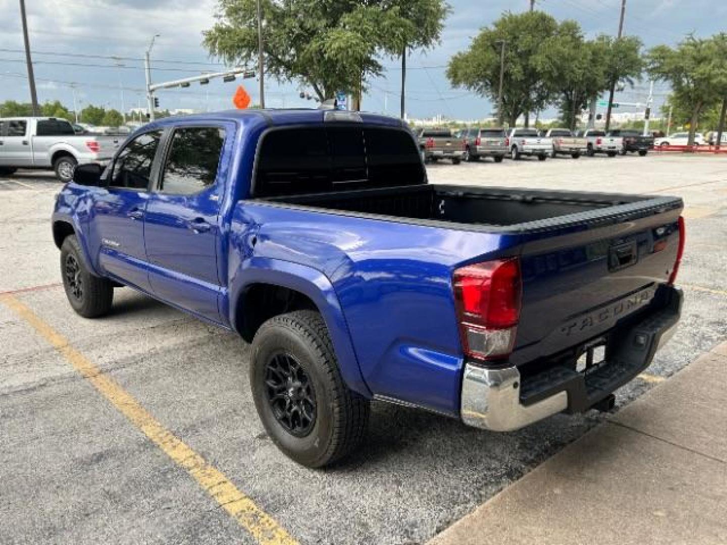 2022 Blue Crush Metallic Toyota Tacoma SR5 V6 | TRD Sport | TRD Off Road (3TMAZ5CN8NM) with an 3.5L V-6 port/direct injection engine, located at 12182 Garland Rd, Dallas, TX, 75218, (214) 521-2040, 0.000000, 0.000000 - Photo#4