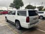 2016 Summit White Chevrolet Suburban LTZ (1GNSCJKC1GR) with an EcoTec3 5.3L V-8 gasoline direct injection engine, located at 12182 Garland Rd, Dallas, TX, 75218, (214) 521-2040, 0.000000, 0.000000 - Photo#4