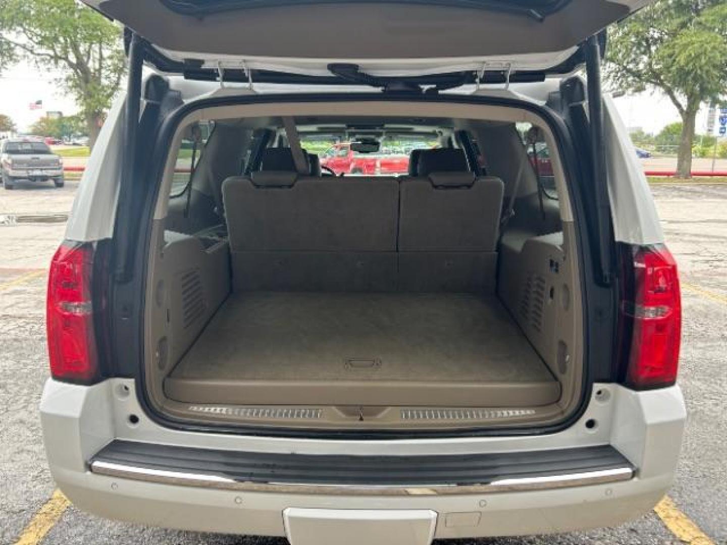 2016 Summit White Chevrolet Suburban LTZ (1GNSCJKC1GR) with an EcoTec3 5.3L V-8 gasoline direct injection engine, located at 12182 Garland Rd, Dallas, TX, 75218, (214) 521-2040, 0.000000, 0.000000 - Photo#8