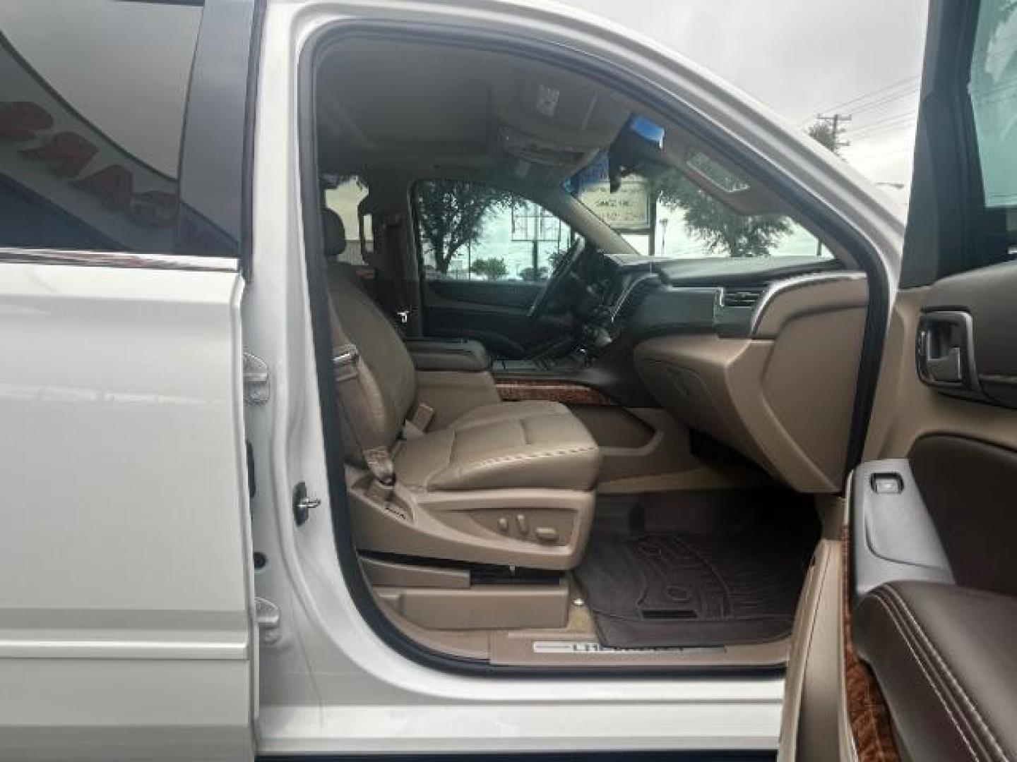 2016 Summit White Chevrolet Suburban LTZ (1GNSCJKC1GR) with an EcoTec3 5.3L V-8 gasoline direct injection engine, located at 12182 Garland Rd, Dallas, TX, 75218, (214) 521-2040, 0.000000, 0.000000 - Photo#9