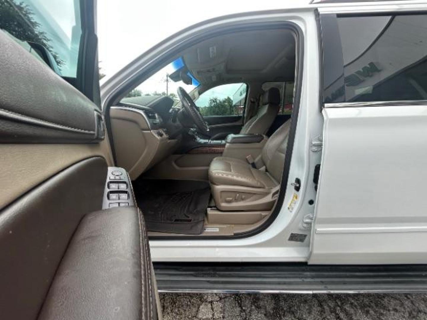 2016 Summit White Chevrolet Suburban LTZ (1GNSCJKC1GR) with an EcoTec3 5.3L V-8 gasoline direct injection engine, located at 12182 Garland Rd, Dallas, TX, 75218, (214) 521-2040, 0.000000, 0.000000 - Photo#13