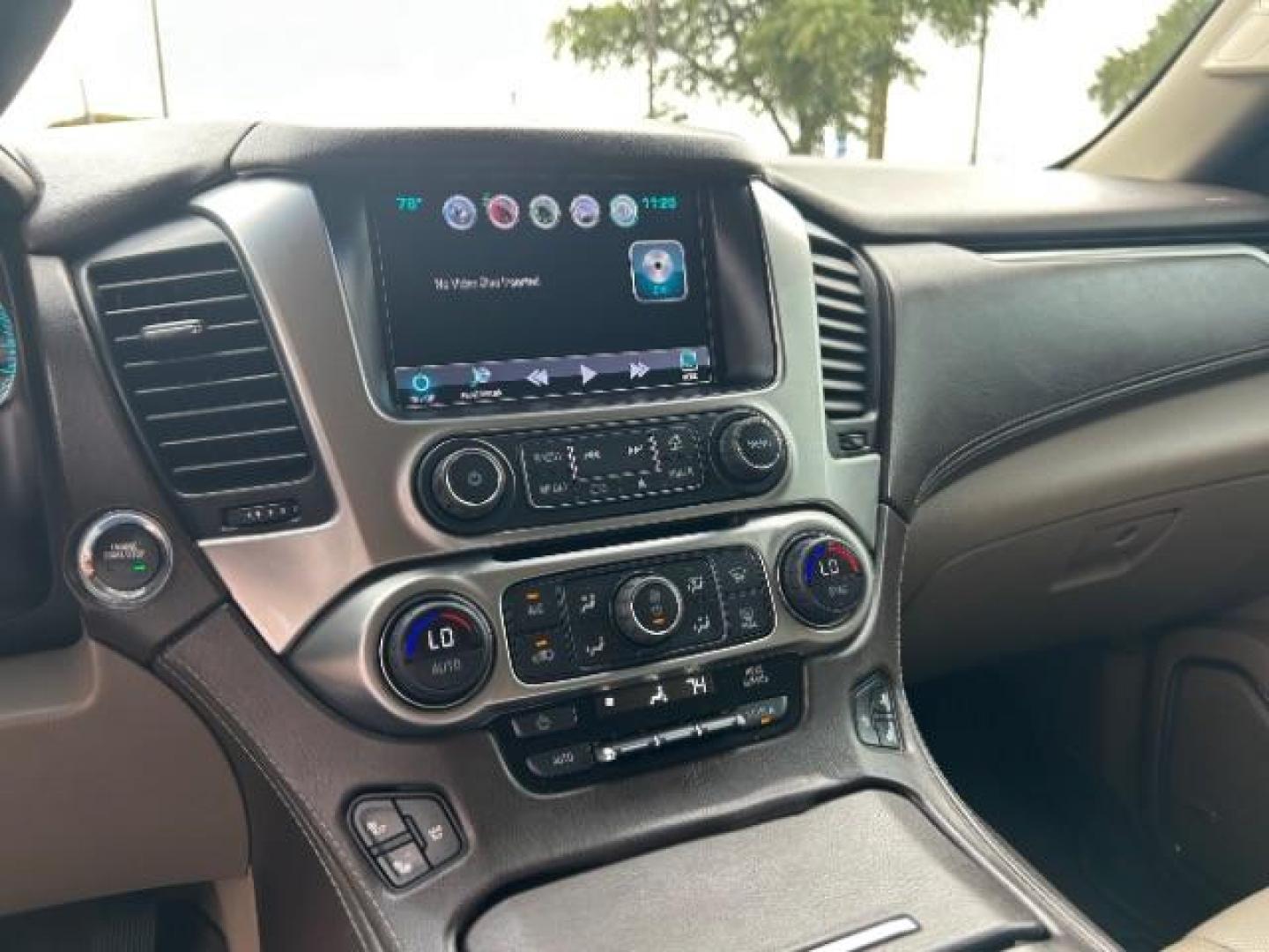 2016 Summit White Chevrolet Suburban LTZ (1GNSCJKC1GR) with an EcoTec3 5.3L V-8 gasoline direct injection engine, located at 12182 Garland Rd, Dallas, TX, 75218, (214) 521-2040, 0.000000, 0.000000 - Photo#14