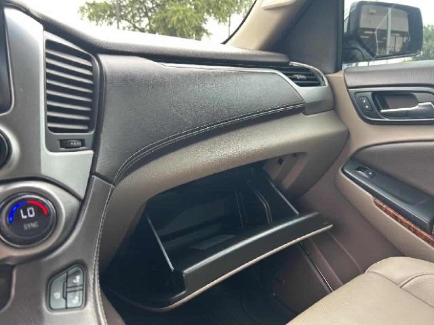 2016 Summit White Chevrolet Suburban LTZ (1GNSCJKC1GR) with an EcoTec3 5.3L V-8 gasoline direct injection engine, located at 12182 Garland Rd, Dallas, TX, 75218, (214) 521-2040, 0.000000, 0.000000 - Photo#15