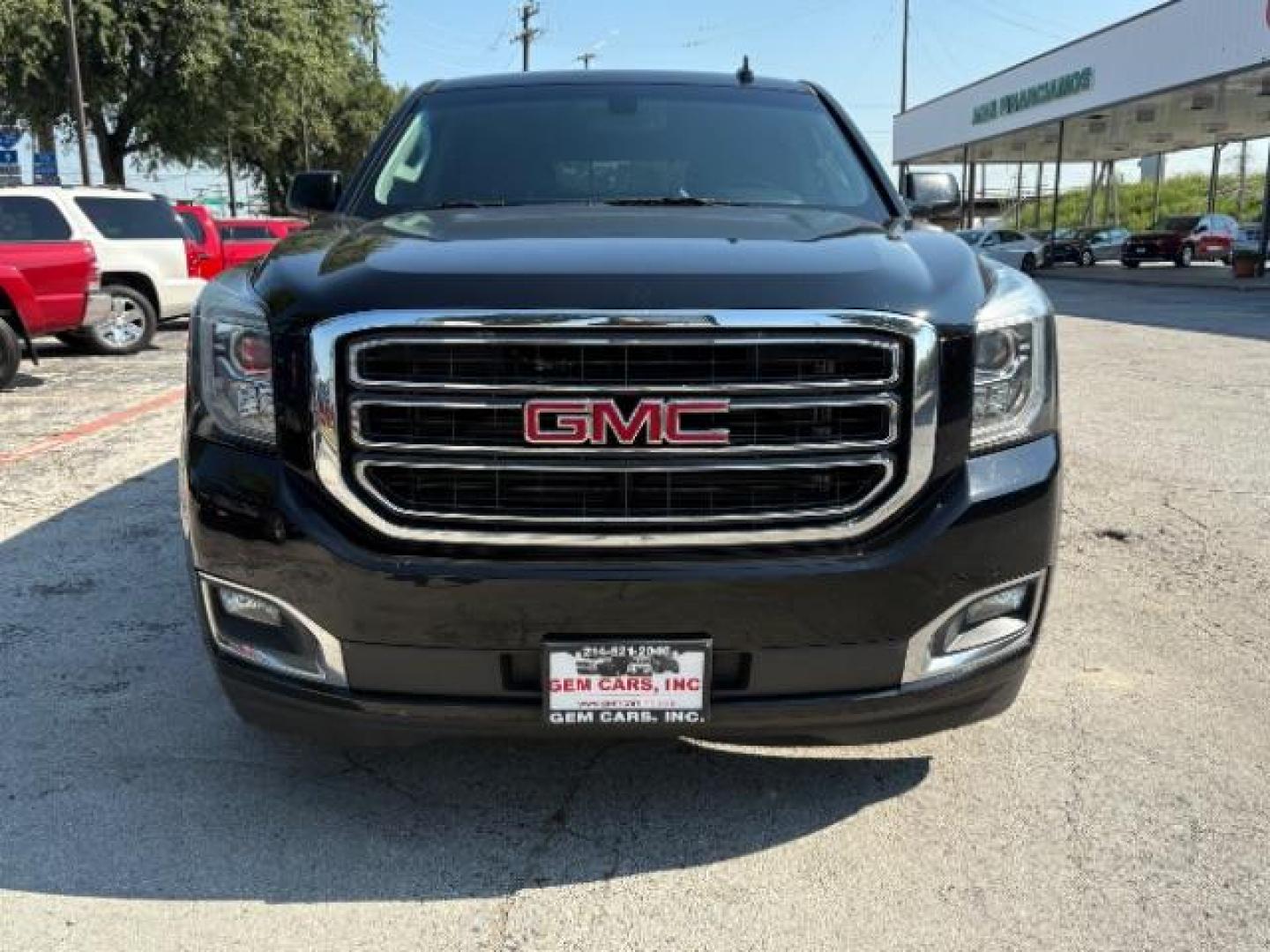 2018 Onyx Black GMC Yukon SLE (1GKS1AKC8JR) with an EcoTec3 5.3L V-8 gasoline direct injection engine, located at 12182 Garland Rd, Dallas, TX, 75218, (214) 521-2040, 0.000000, 0.000000 - Photo#1