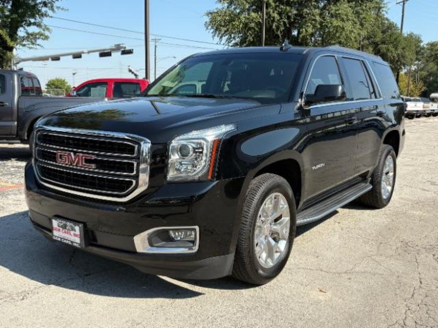 2018 Onyx Black GMC Yukon SLE (1GKS1AKC8JR) with an EcoTec3 5.3L V-8 gasoline direct injection engine, located at 12182 Garland Rd, Dallas, TX, 75218, (214) 521-2040, 0.000000, 0.000000 - Photo#2