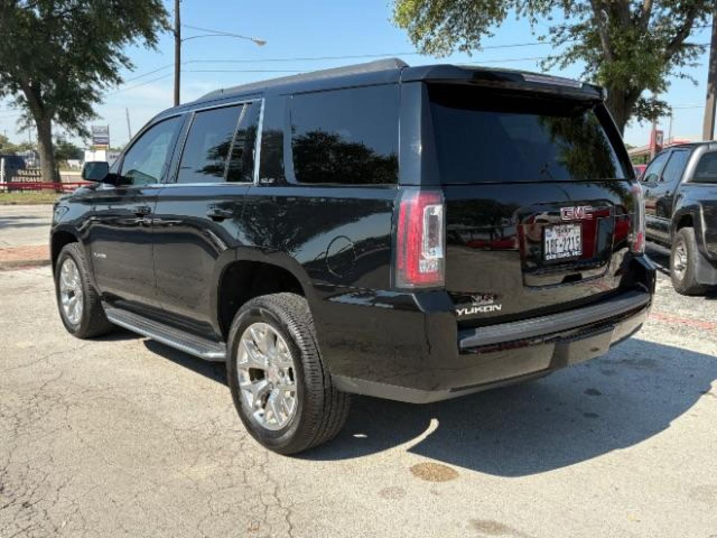 2018 Onyx Black GMC Yukon SLE (1GKS1AKC8JR) with an EcoTec3 5.3L V-8 gasoline direct injection engine, located at 12182 Garland Rd, Dallas, TX, 75218, (214) 521-2040, 0.000000, 0.000000 - Photo#4