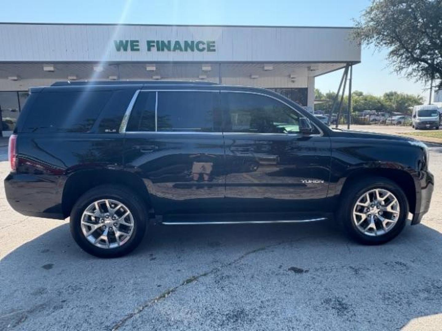 2018 Onyx Black GMC Yukon SLE (1GKS1AKC8JR) with an EcoTec3 5.3L V-8 gasoline direct injection engine, located at 12182 Garland Rd, Dallas, TX, 75218, (214) 521-2040, 0.000000, 0.000000 - Photo#6