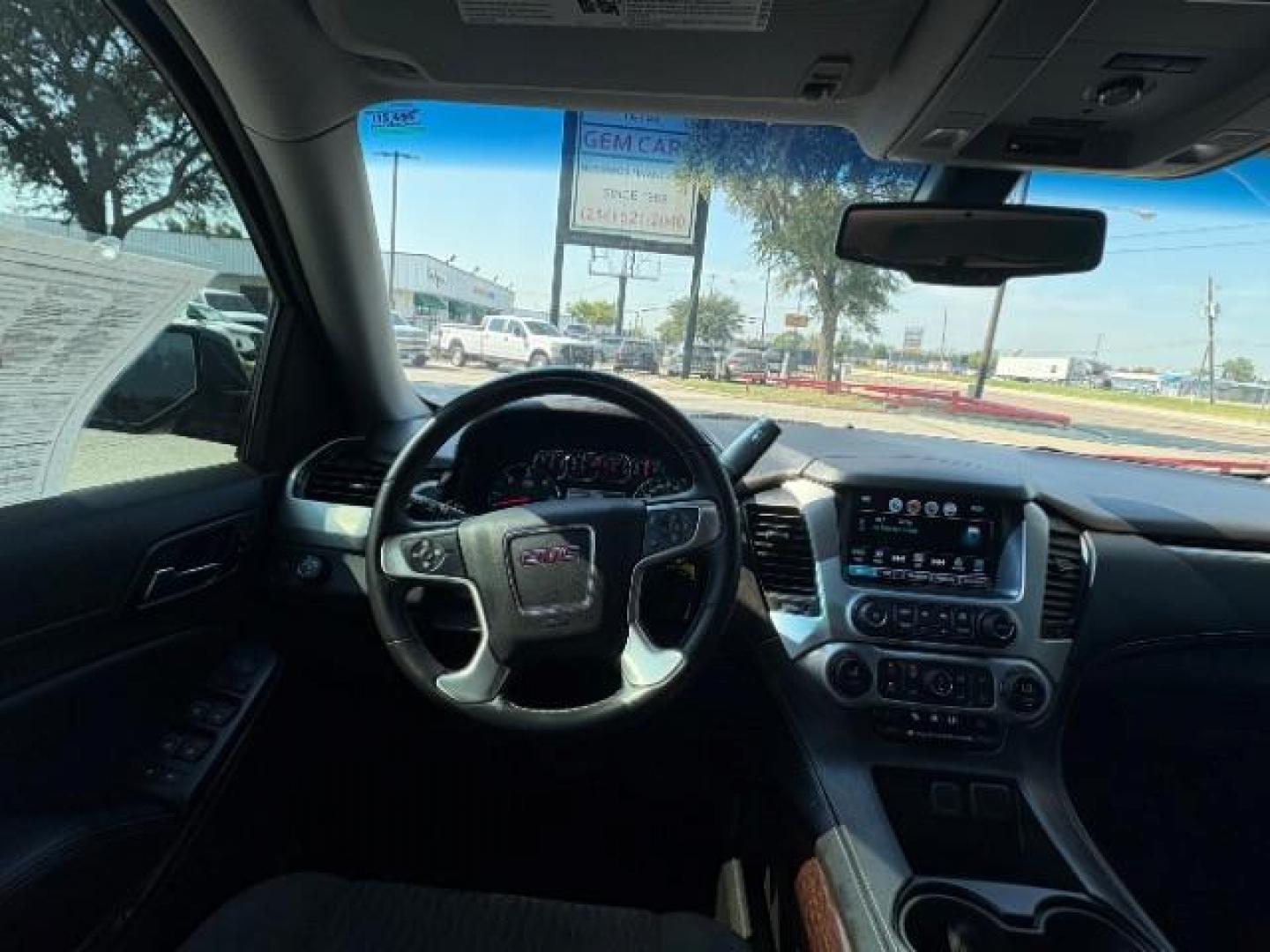 2018 Onyx Black GMC Yukon SLE (1GKS1AKC8JR) with an EcoTec3 5.3L V-8 gasoline direct injection engine, located at 12182 Garland Rd, Dallas, TX, 75218, (214) 521-2040, 0.000000, 0.000000 - Photo#16