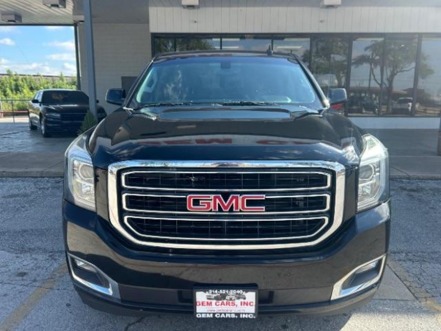 2018 Onyx Black GMC Yukon SLE (1GKS1AKC8JR) with an EcoTec3 5.3L V-8 gas engine, located at 12182 Garland Rd, Dallas, TX, 75218, (214) 521-2040, 0.000000, 0.000000 - Photo#1
