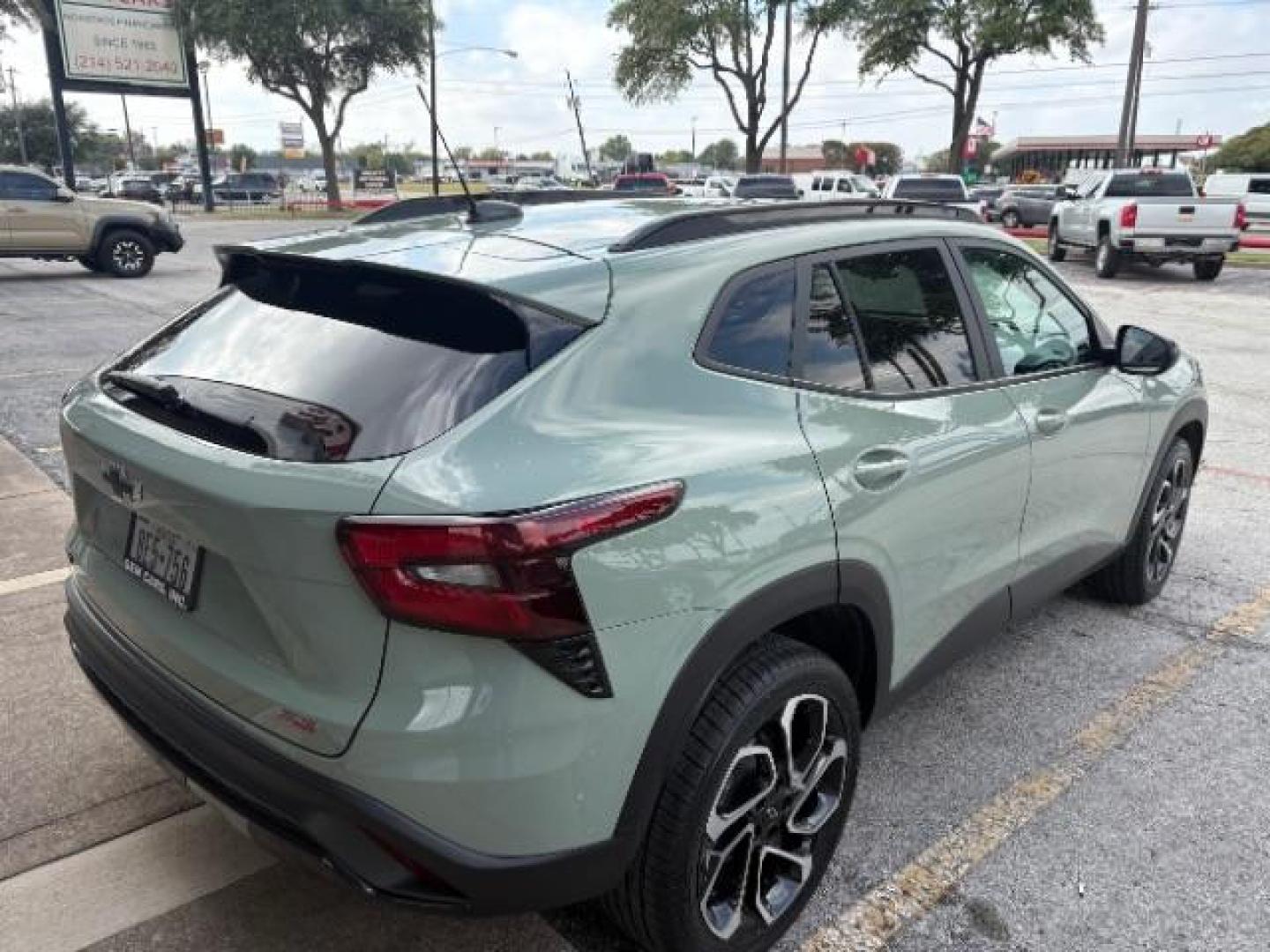 2024 Cacti Green /Jet Black w/Red Accents Chevrolet Trax FWD 2RS (KL77LJE28RC) with an Ecotec 1.2L I-3 gasoline direct injection engine, TRANSMISSION, 6-SPD AUTOMATIC transmission, located at 12182 Garland Rd, Dallas, TX, 75218, (214) 521-2040, 0.000000, 0.000000 - Photo#7
