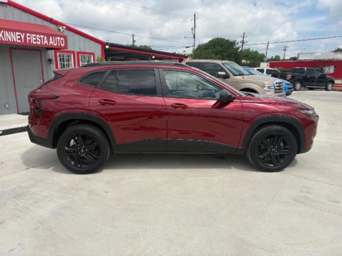 2024 Crimson Metallic /Jet Black w/Artemis Chevrolet Trax FWD ACTIV (KL77LKE27RC) with an 1.2L I-3 gasoline di engine, 6-Speed Automatic transmission, located at 12182 Garland Rd, Dallas, TX, 75218, (214) 521-2040, 0.000000, 0.000000 - Photo#5