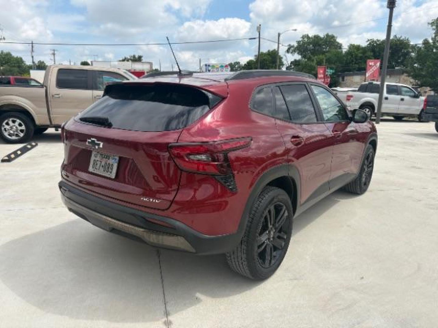 2024 Crimson Metallic /Jet Black w/Artemis Chevrolet Trax FWD ACTIV (KL77LKE27RC) with an 1.2L I-3 gasoline di engine, 6-Speed Automatic transmission, located at 12182 Garland Rd, Dallas, TX, 75218, (214) 521-2040, 0.000000, 0.000000 - Photo#6