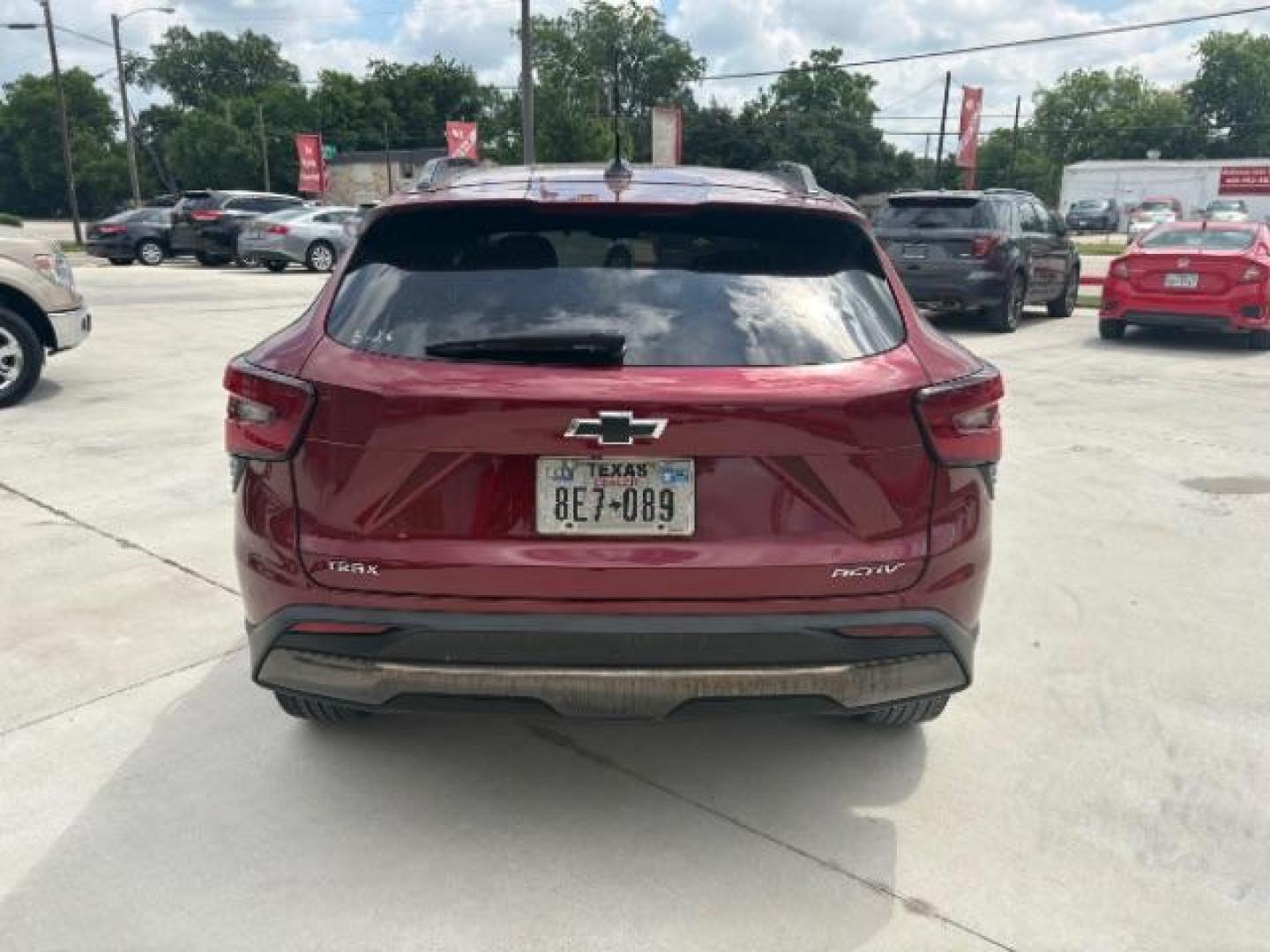 2024 Crimson Metallic /Jet Black w/Artemis Chevrolet Trax FWD ACTIV (KL77LKE27RC) with an 1.2L I-3 gasoline di engine, 6-Speed Automatic transmission, located at 12182 Garland Rd, Dallas, TX, 75218, (214) 521-2040, 0.000000, 0.000000 - Photo#7
