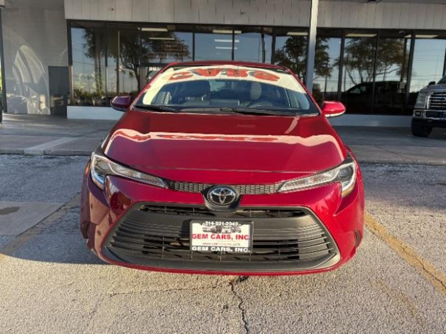 2024 Ruby Flare Pearl Toyota Corolla LE (5YFB4MDE8RP) with an Dynamic Force 2L I-4 port/direct injection engine, located at 12182 Garland Rd, Dallas, TX, 75218, (214) 521-2040, 0.000000, 0.000000 - Photo#1