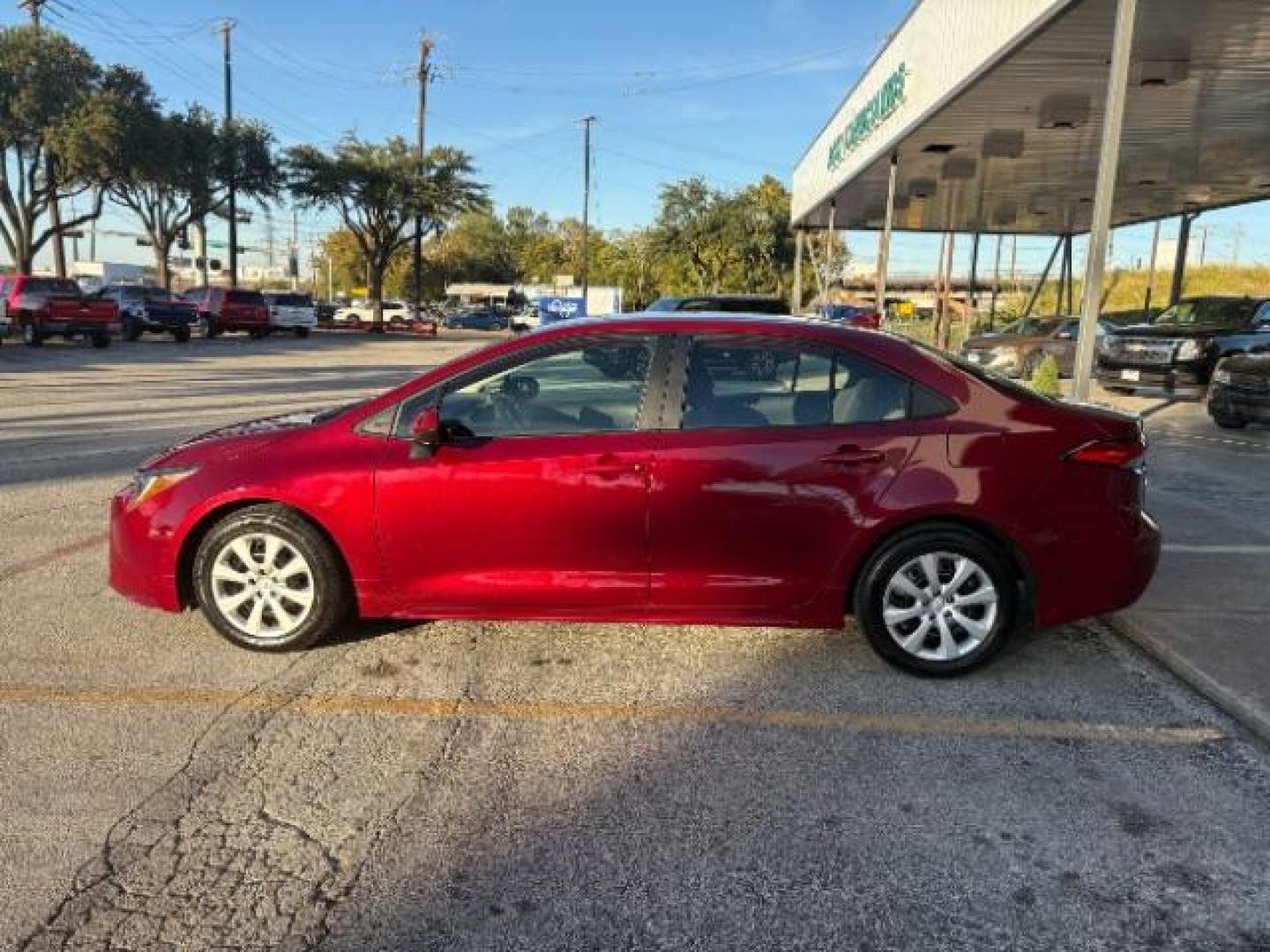 2024 Ruby Flare Pearl Toyota Corolla LE (5YFB4MDE8RP) with an Dynamic Force 2L I-4 port/direct injection engine, located at 12182 Garland Rd, Dallas, TX, 75218, (214) 521-2040, 0.000000, 0.000000 - Photo#3
