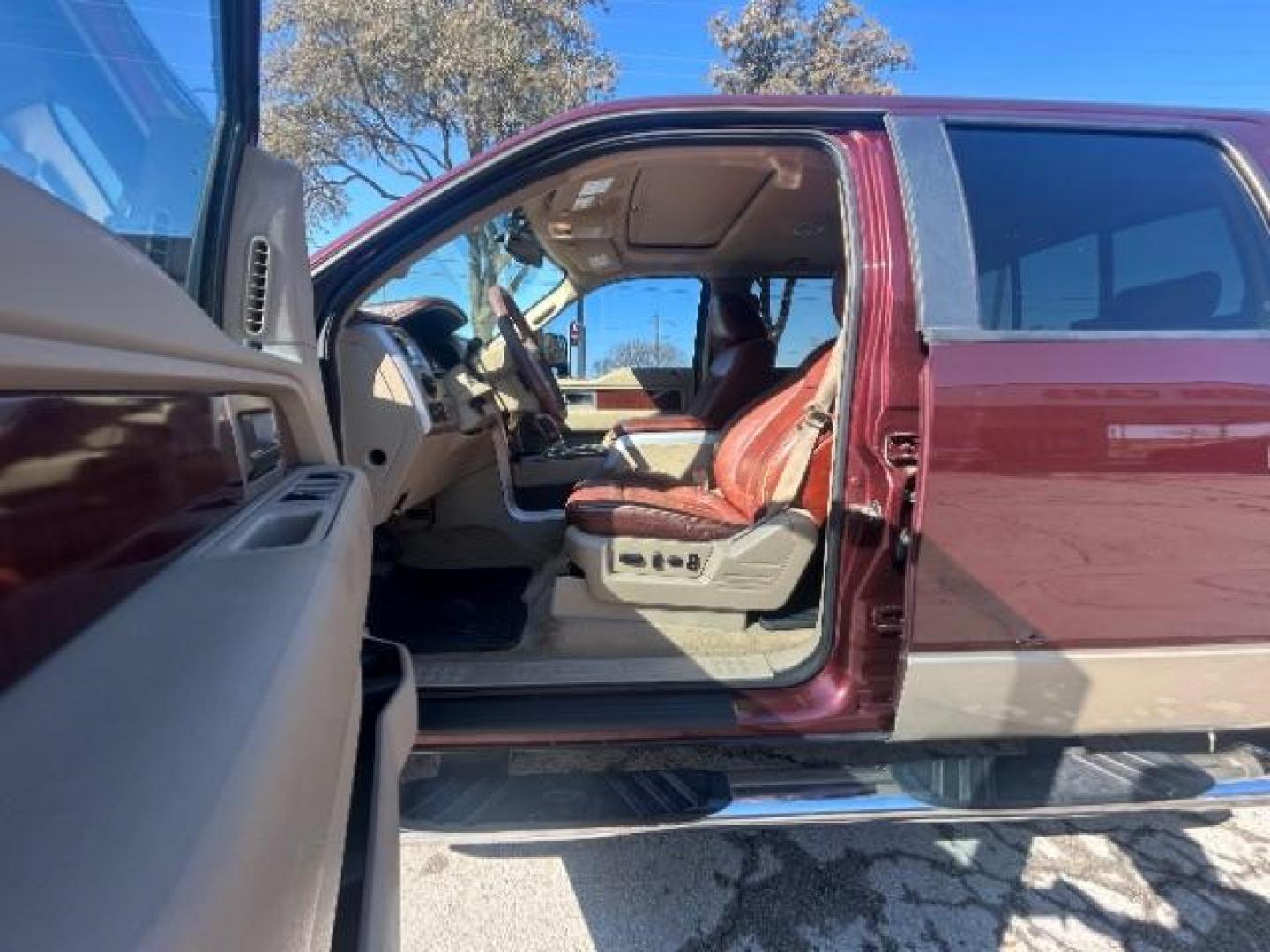 2009 Royal Red Clearcoat Ford F-150 King Ranch (1FTPW14V39K) with an Triton 4.6L V-8 regu engine, located at 12182 Garland Rd, Dallas, TX, 75218, (214) 521-2040, 0.000000, 0.000000 - Photo#12