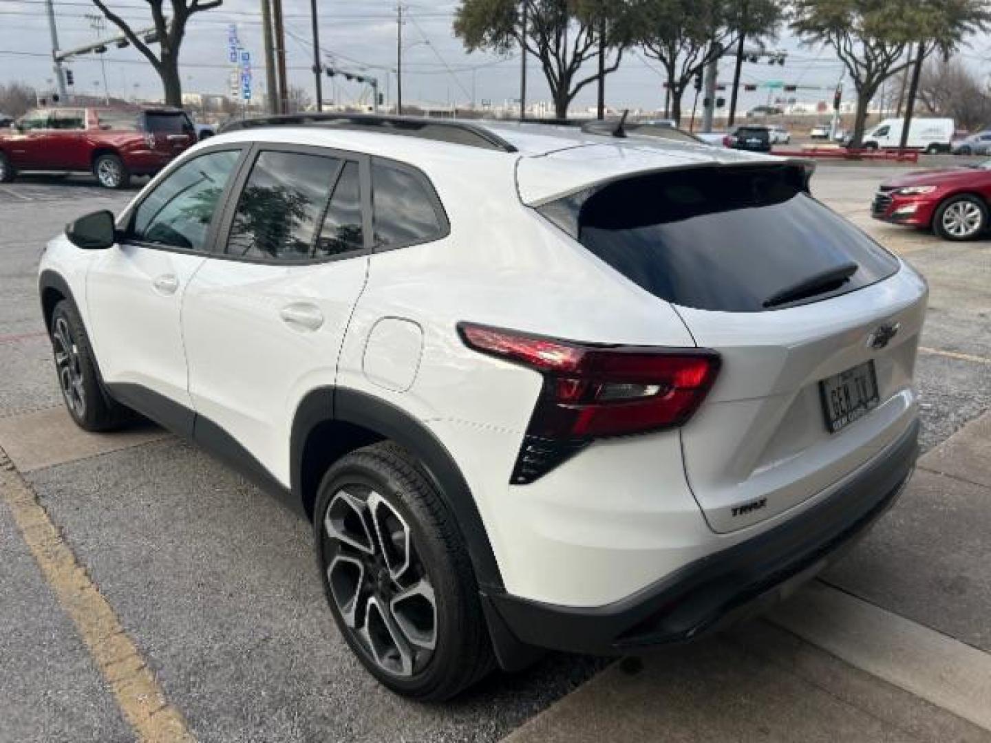 2024 Summit White /Jet Black w/Red Accents Chevrolet Trax FWD 2RS (KL77LJE2XRC) with an Ecotec 1.2L I-3 gasoline direct injection engine, TRANSMISSION, 6-SPD AUTOMATIC transmission, located at 12182 Garland Rd, Dallas, TX, 75218, (214) 521-2040, 0.000000, 0.000000 - Photo#3