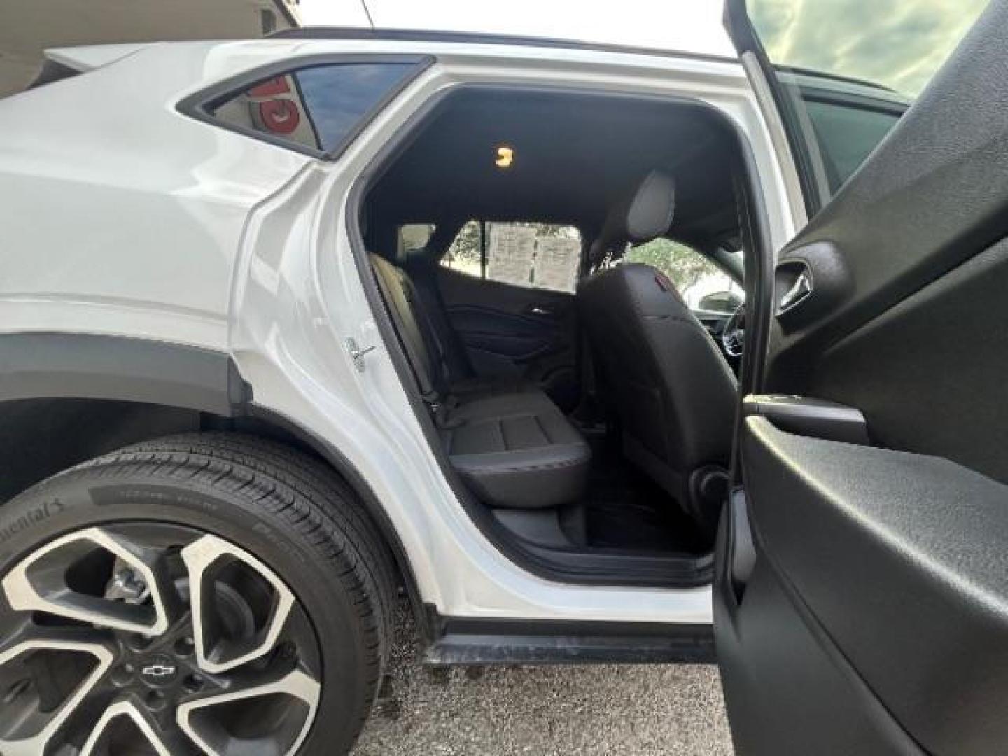 2024 Summit White /Jet Black w/Red Accents Chevrolet Trax FWD 2RS (KL77LJE2XRC) with an Ecotec 1.2L I-3 gasoline direct injection engine, TRANSMISSION, 6-SPD AUTOMATIC transmission, located at 12182 Garland Rd, Dallas, TX, 75218, (214) 521-2040, 0.000000, 0.000000 - Photo#9