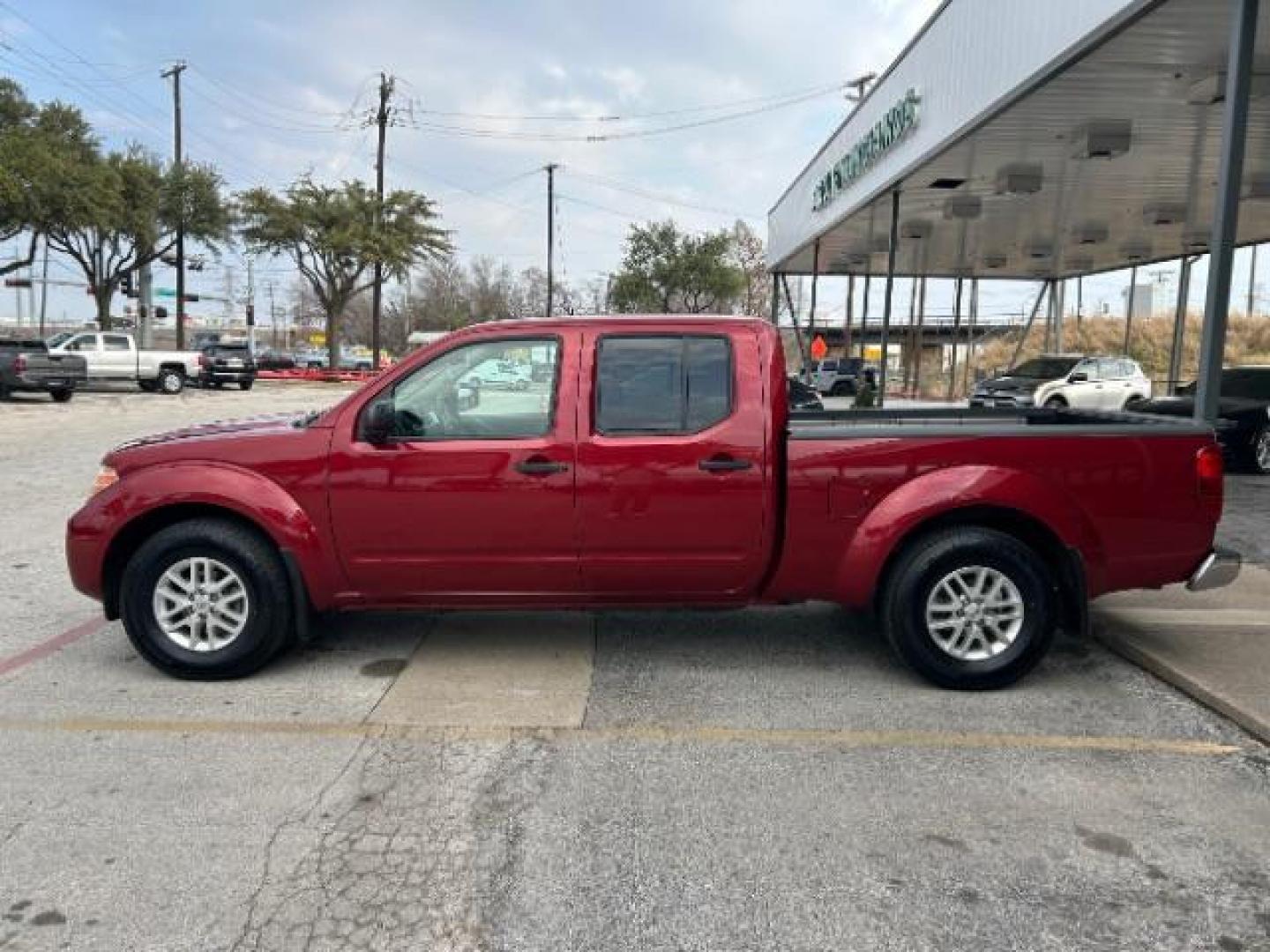 2019 Cayenne Red Metallic /Steel Nissan Frontier SV (1N6AD0FR2KN) with an VQ 4L V-6 DOHC engine, Automatic transmission, located at 12182 Garland Rd, Dallas, TX, 75218, (214) 521-2040, 0.000000, 0.000000 - Photo#3