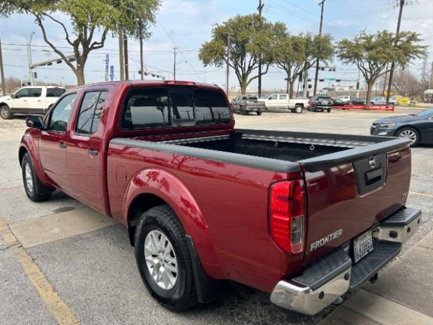 2019 Cayenne Red Metallic /Steel Nissan Frontier SV (1N6AD0FR2KN) with an VQ 4L V-6 DOHC engine, Automatic transmission, located at 12182 Garland Rd, Dallas, TX, 75218, (214) 521-2040, 0.000000, 0.000000 - Photo#4