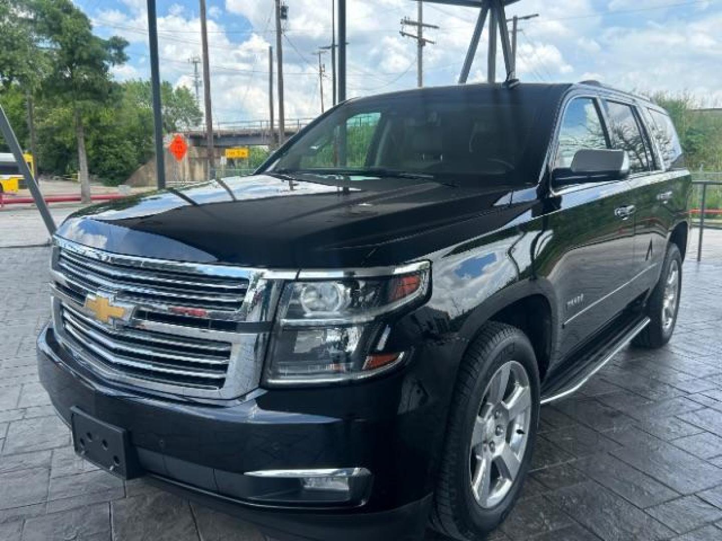2017 Black /Jet Black Chevrolet Tahoe Premier (1GNSCCKC6HR) with an EcoTec3 5.3L V-8 gas engine, located at 12182 Garland Rd, Dallas, TX, 75218, (214) 521-2040, 0.000000, 0.000000 - Photo#4