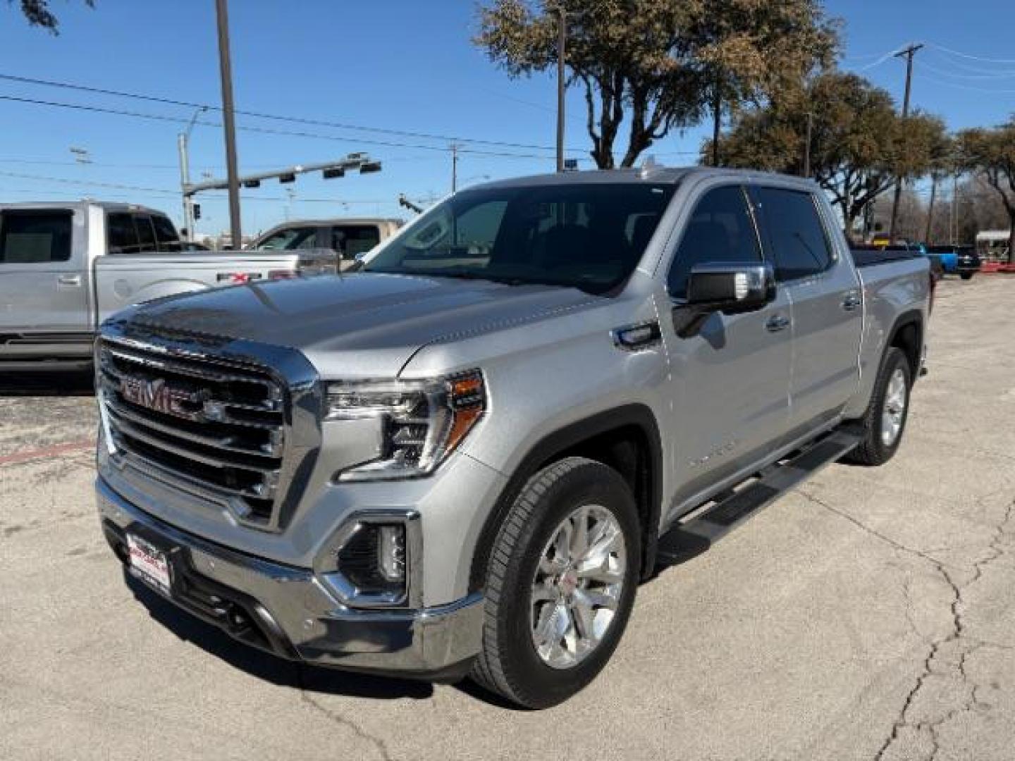 2019 Satin Steel Metallic /Black Leather Interior GMC Sierra 1500 SLT Texas Edition (3GTP8DED9KG) with an EcoTec3 5.3L V-8 gasoline direct injection engine, 6-Speed Automatic transmission, located at 12182 Garland Rd, Dallas, TX, 75218, (214) 521-2040, 0.000000, 0.000000 - Photo#2