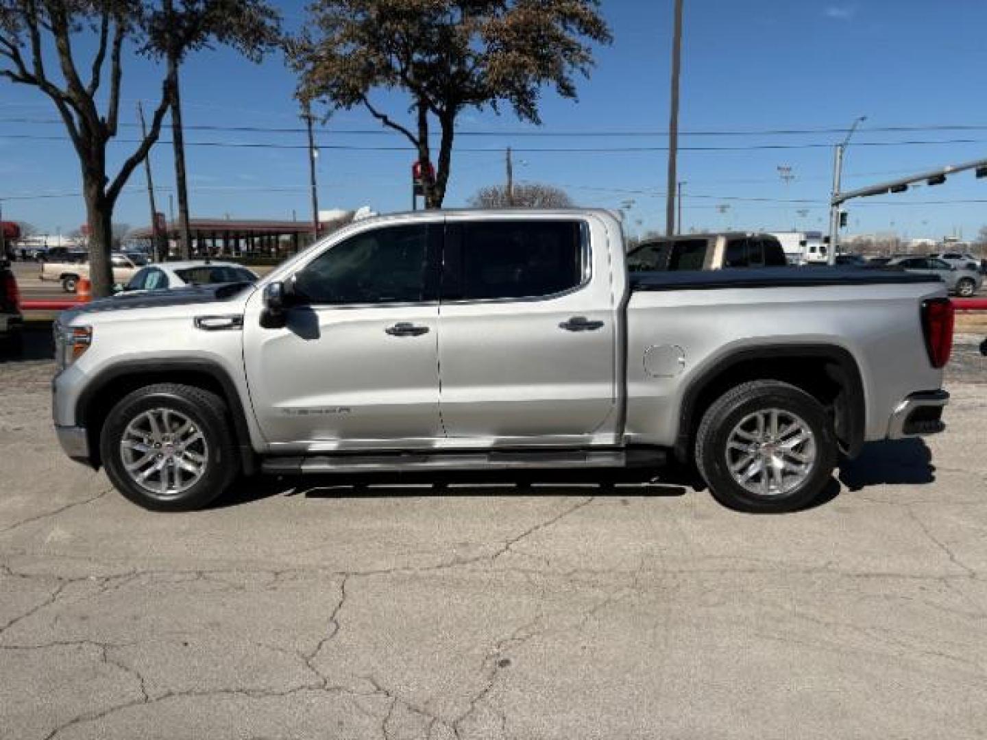 2019 Satin Steel Metallic /Black Leather Interior GMC Sierra 1500 SLT Texas Edition (3GTP8DED9KG) with an EcoTec3 5.3L V-8 gasoline direct injection engine, 6-Speed Automatic transmission, located at 12182 Garland Rd, Dallas, TX, 75218, (214) 521-2040, 0.000000, 0.000000 - Photo#3