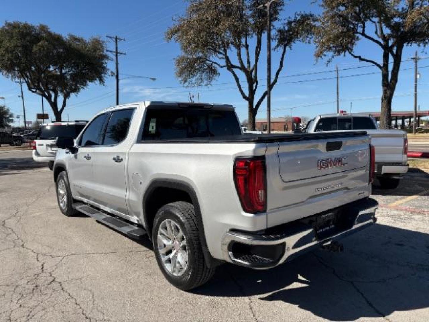 2019 Satin Steel Metallic /Black Leather Interior GMC Sierra 1500 SLT Texas Edition (3GTP8DED9KG) with an EcoTec3 5.3L V-8 gasoline direct injection engine, 6-Speed Automatic transmission, located at 12182 Garland Rd, Dallas, TX, 75218, (214) 521-2040, 0.000000, 0.000000 - Photo#4
