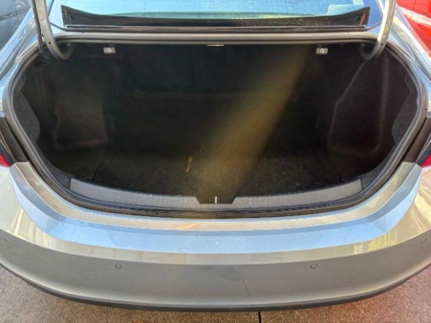 2024 Mineral Gray Metallic Chevrolet Malibu FWD 1LT (1G1ZD5ST7RF) with an ECOTEC 1.5L I-4 gasoline direct injection engine, located at 12182 Garland Rd, Dallas, TX, 75218, (214) 521-2040, 0.000000, 0.000000 - Photo#34