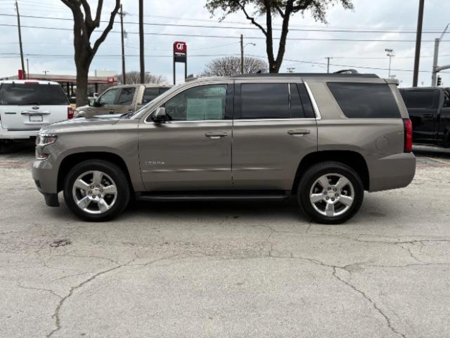 2017 Tungsten Metallic Chevrolet Tahoe LS (1GNSCAKC7HR) with an EcoTec3 5.3L V-8 gasoline direct injection engine, located at 12182 Garland Rd, Dallas, TX, 75218, (214) 521-2040, 0.000000, 0.000000 - Photo#1