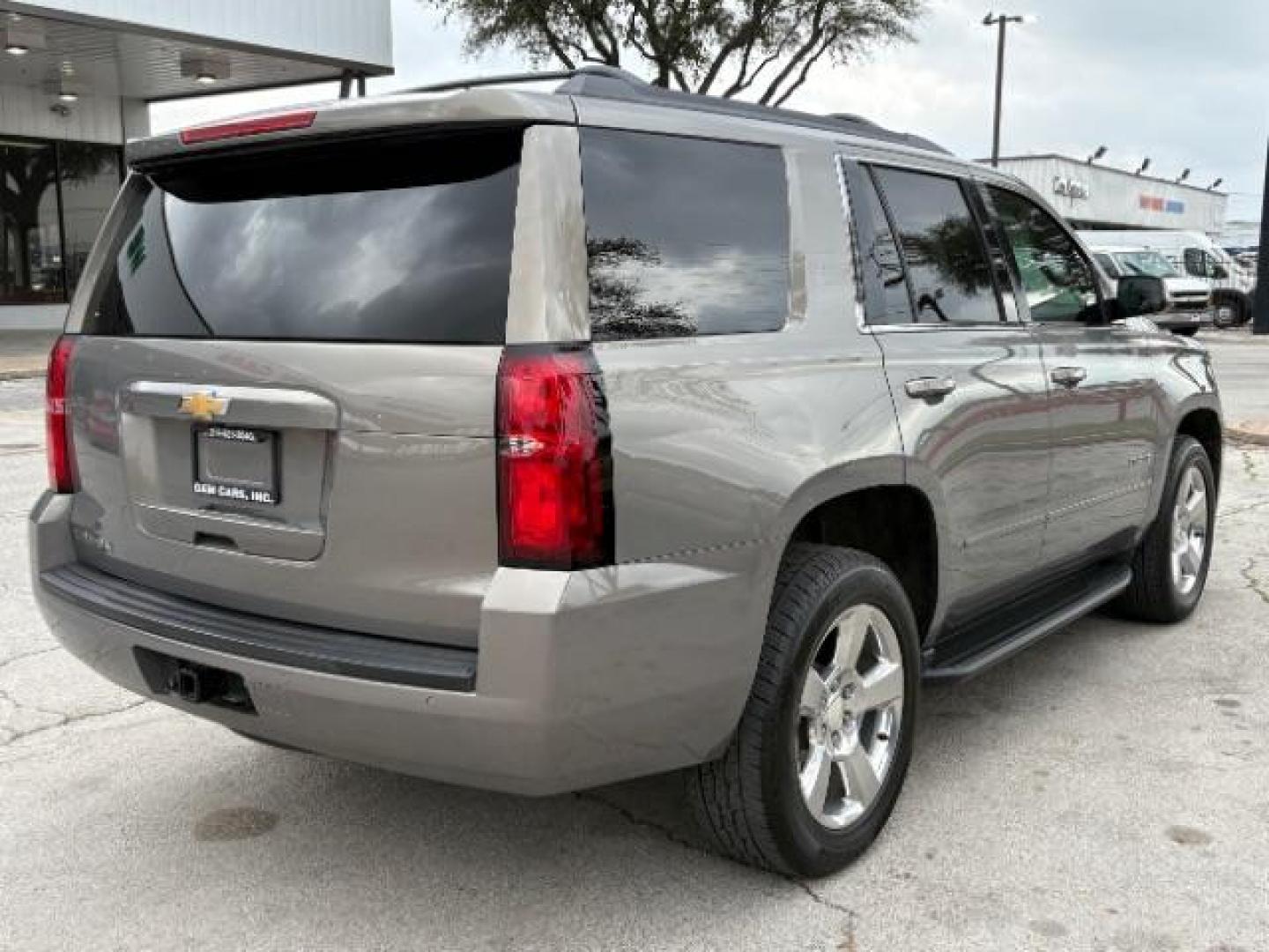 2017 Tungsten Metallic Chevrolet Tahoe LS (1GNSCAKC7HR) with an EcoTec3 5.3L V-8 gasoline direct injection engine, located at 12182 Garland Rd, Dallas, TX, 75218, (214) 521-2040, 0.000000, 0.000000 - Photo#4