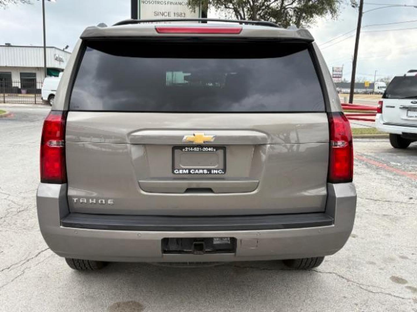 2017 Tungsten Metallic Chevrolet Tahoe LS (1GNSCAKC7HR) with an EcoTec3 5.3L V-8 gasoline direct injection engine, located at 12182 Garland Rd, Dallas, TX, 75218, (214) 521-2040, 0.000000, 0.000000 - Photo#5