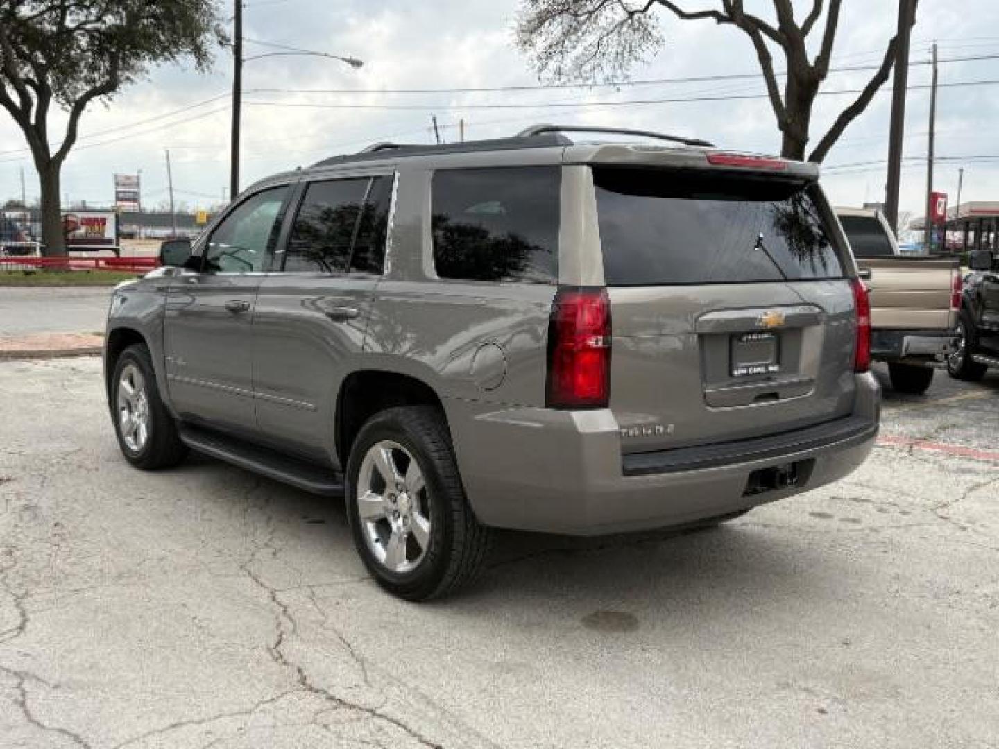 2017 Tungsten Metallic Chevrolet Tahoe LS (1GNSCAKC7HR) with an EcoTec3 5.3L V-8 gasoline direct injection engine, located at 12182 Garland Rd, Dallas, TX, 75218, (214) 521-2040, 0.000000, 0.000000 - Photo#6