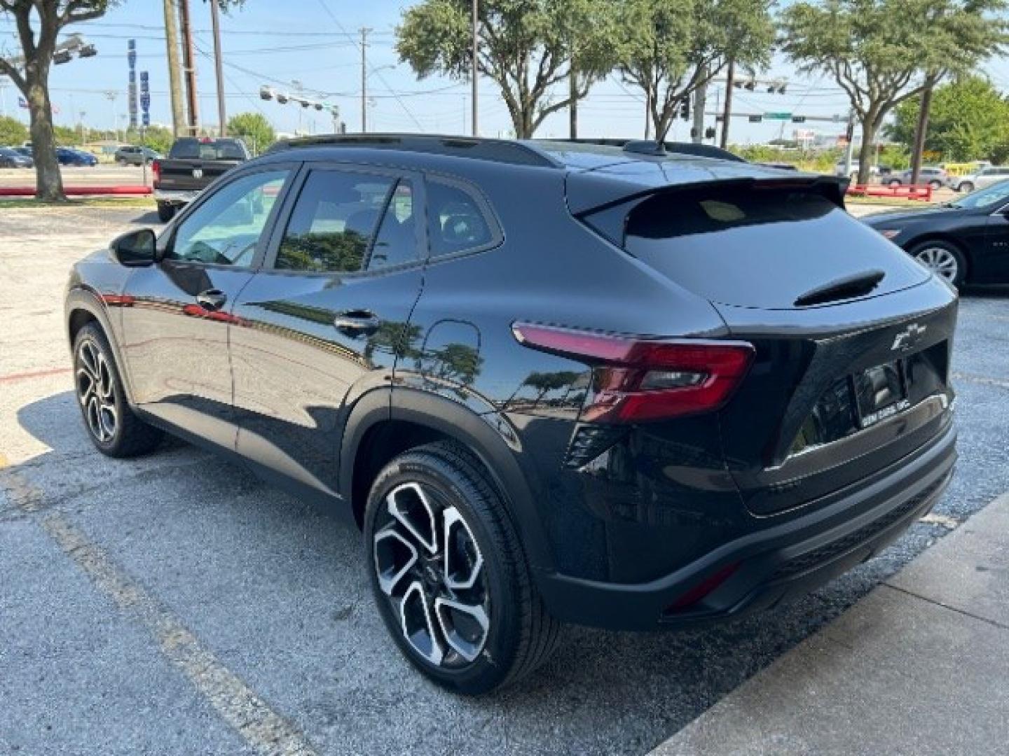 2024 Mosaic Black Metalli /Jet Black w/Red Acce Chevrolet Trax FWD 2RS (KL77LJE29RC) with an Ecotec 1.2L I-3 gaso engine, 6-Speed Automatic transmission, located at 12182 Garland Rd, Dallas, TX, 75218, (214) 521-2040, 0.000000, 0.000000- Photo#2
