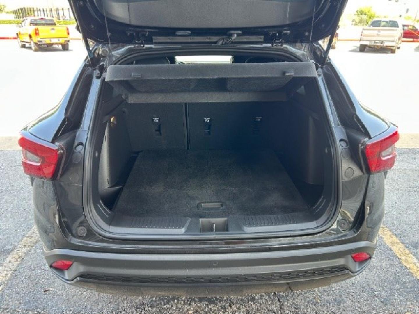 2024 Mosaic Black Metalli /Jet Black w/Red Acce Chevrolet Trax FWD 2RS (KL77LJE29RC) with an Ecotec 1.2L I-3 gaso engine, 6-Speed Automatic transmission, located at 12182 Garland Rd, Dallas, TX, 75218, (214) 521-2040, 0.000000, 0.000000- Photo#6