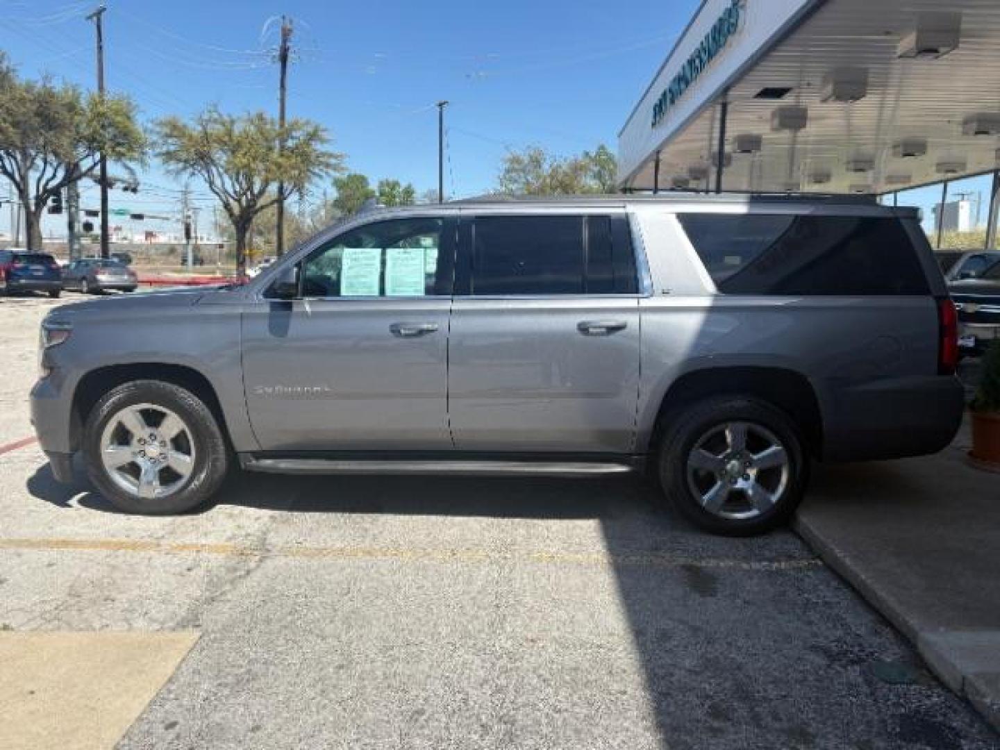 2018 Tungsten Metallic /Jet Black Chevrolet Suburban LT (1GNSCHKC5JR) with an EcoTec3 5.3L V-8 gasoline direct injection engine, 6-Speed Automatic transmission, located at 12182 Garland Rd, Dallas, TX, 75218, (214) 521-2040, 0.000000, 0.000000 - Photo#3