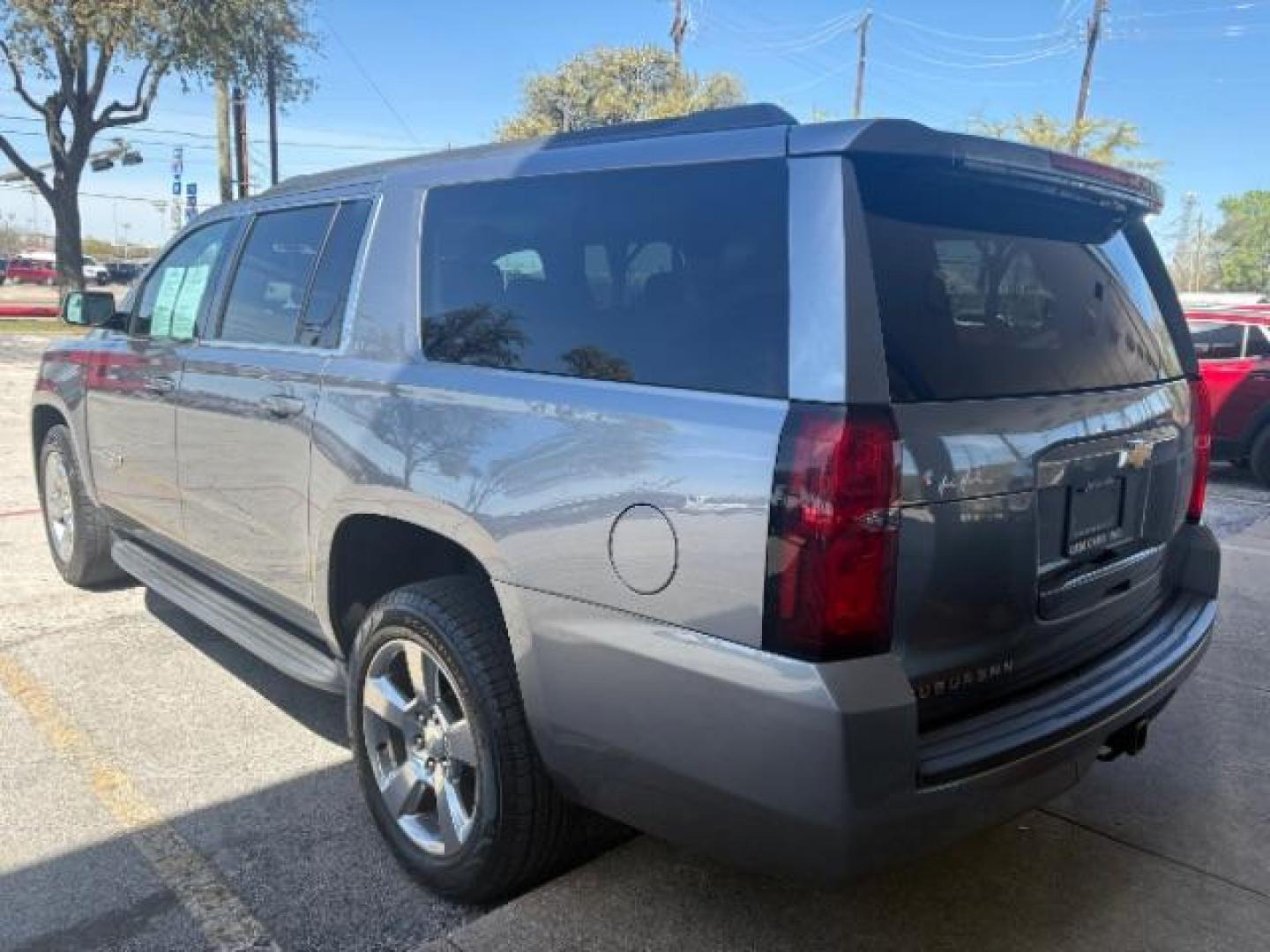 2018 Tungsten Metallic /Jet Black Chevrolet Suburban LT (1GNSCHKC5JR) with an EcoTec3 5.3L V-8 gasoline direct injection engine, 6-Speed Automatic transmission, located at 12182 Garland Rd, Dallas, TX, 75218, (214) 521-2040, 0.000000, 0.000000 - Photo#4