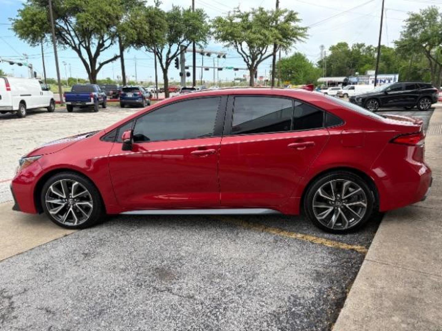 2021 Barcelona Red Metallic /Black Toyota Corolla SE (5YFS4MCE4MP) with an Dynamic Force 2L I-4 port/direct injection engine, located at 12182 Garland Rd, Dallas, TX, 75218, (214) 521-2040, 0.000000, 0.000000 - Photo#5