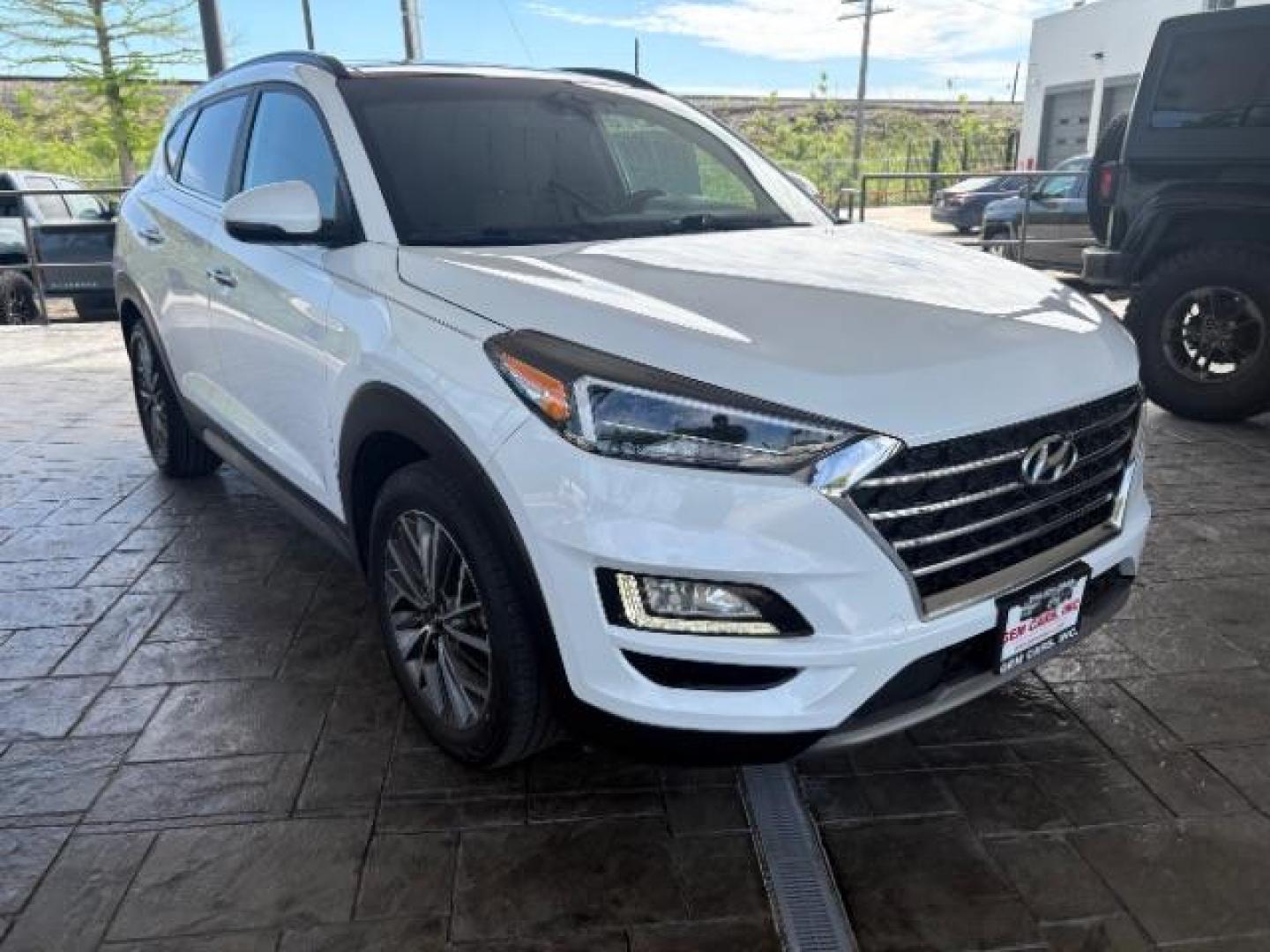 2021 Winter White Hyundai Tucson Ultimate (KM8J33AL2MU) with an Theta 2.4L I-4 gasoline direct injection engine, located at 12182 Garland Rd, Dallas, TX, 75218, (214) 521-2040, 0.000000, 0.000000 - Photo#0