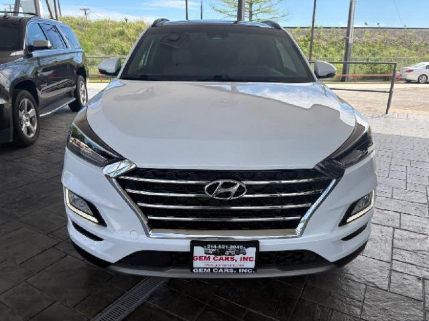2021 Winter White Hyundai Tucson Ultimate (KM8J33AL2MU) with an Theta 2.4L I-4 gasoline direct injection engine, located at 12182 Garland Rd, Dallas, TX, 75218, (214) 521-2040, 0.000000, 0.000000 - Photo#1