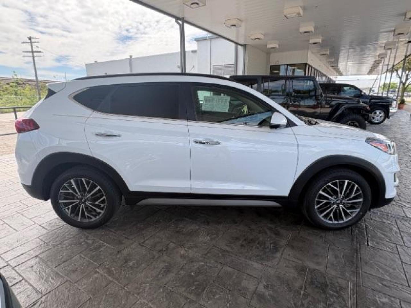 2021 Winter White Hyundai Tucson Ultimate (KM8J33AL2MU) with an Theta 2.4L I-4 gasoline direct injection engine, located at 12182 Garland Rd, Dallas, TX, 75218, (214) 521-2040, 0.000000, 0.000000 - Photo#5