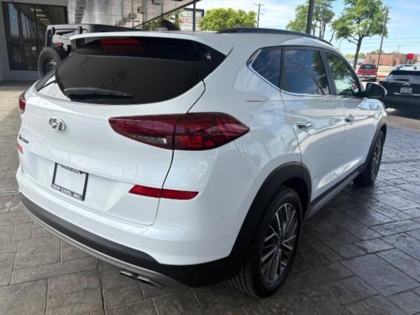 2021 Winter White Hyundai Tucson Ultimate (KM8J33AL2MU) with an Theta 2.4L I-4 gasoline direct injection engine, located at 12182 Garland Rd, Dallas, TX, 75218, (214) 521-2040, 0.000000, 0.000000 - Photo#6