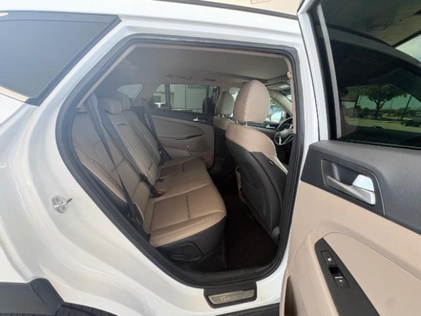 2021 Winter White Hyundai Tucson Ultimate (KM8J33AL2MU) with an Theta 2.4L I-4 gasoline direct injection engine, located at 12182 Garland Rd, Dallas, TX, 75218, (214) 521-2040, 0.000000, 0.000000 - Photo#11