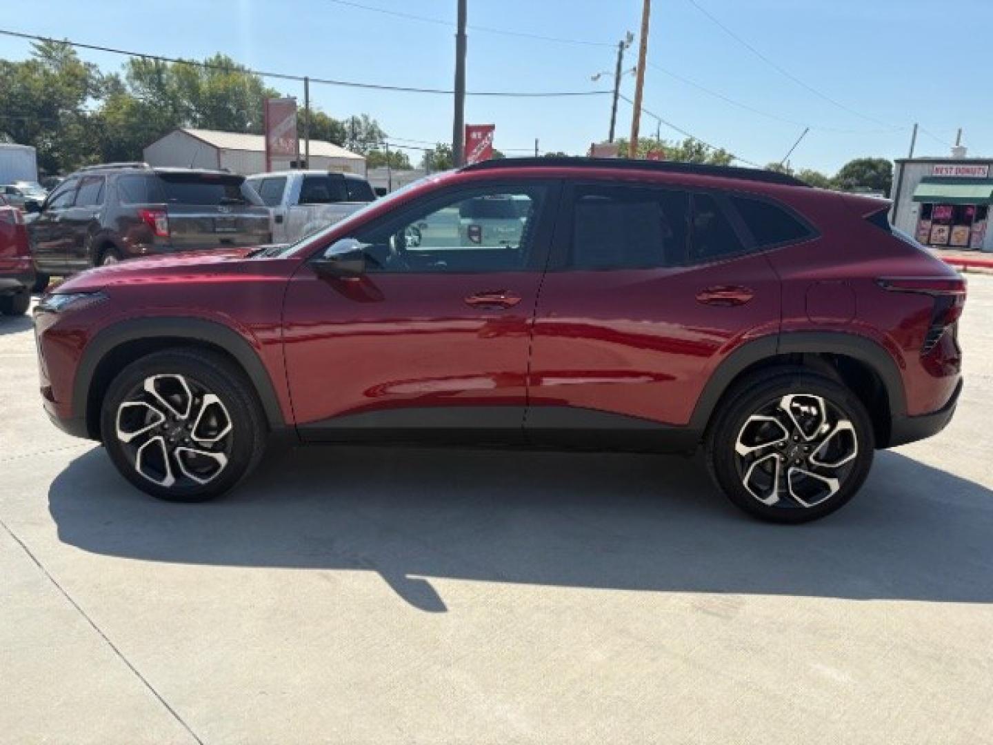 2025 Crimson Metallic Chevrolet Trax FWD 2RS (KL77LJEP6SC) with an ECOTEC 1.2L I-3 gasoline direct injection engine, located at 12182 Garland Rd, Dallas, TX, 75218, (214) 521-2040, 0.000000, 0.000000- Photo#3