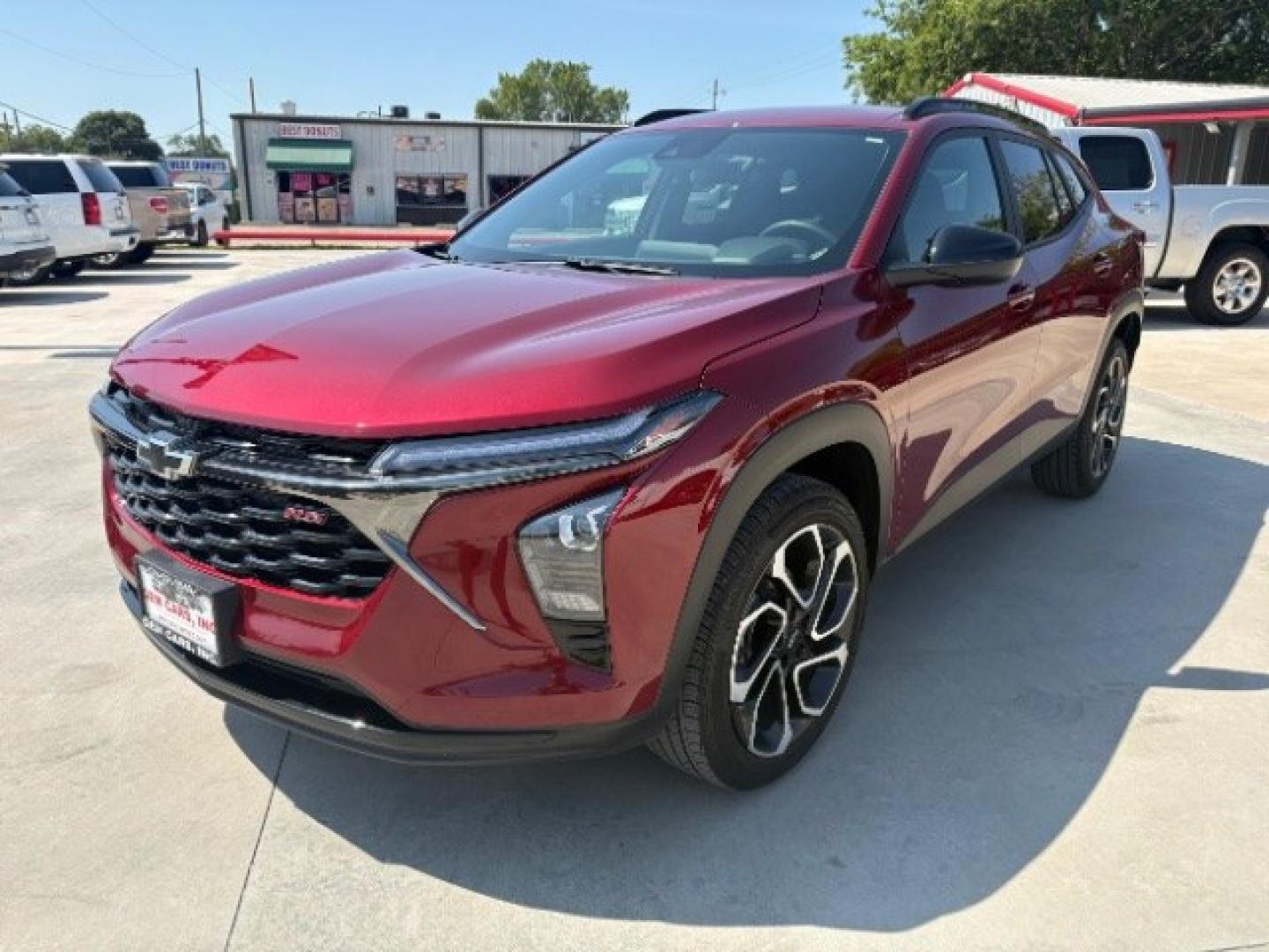 2025 Crimson Metallic Chevrolet Trax FWD 2RS (KL77LJEP6SC) with an ECOTEC 1.2L I-3 gasoline direct injection engine, located at 12182 Garland Rd, Dallas, TX, 75218, (214) 521-2040, 0.000000, 0.000000- Photo#4