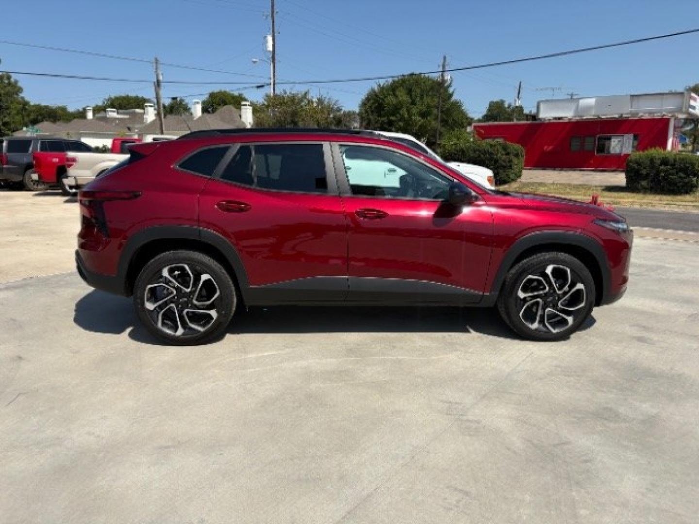 2025 Crimson Metallic Chevrolet Trax FWD 2RS (KL77LJEP6SC) with an ECOTEC 1.2L I-3 gasoline direct injection engine, located at 12182 Garland Rd, Dallas, TX, 75218, (214) 521-2040, 0.000000, 0.000000- Photo#7