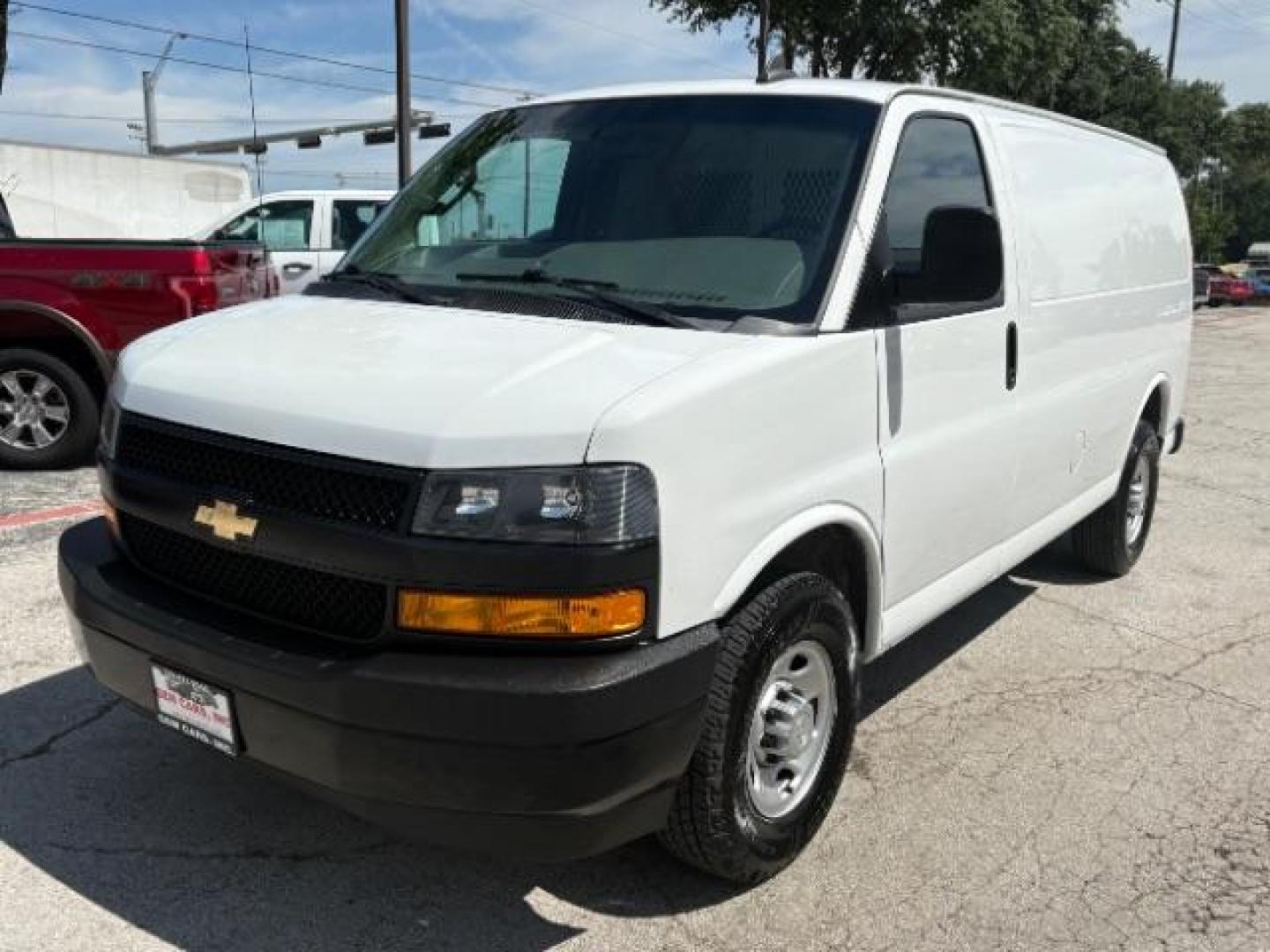 2021 Summit White Chevrolet Express Cargo RWD 2500 Regular Wheelbase WT (1GCWGAFP0M1) , located at 12182 Garland Rd, Dallas, TX, 75218, (214) 521-2040, 0.000000, 0.000000 - Photo#2